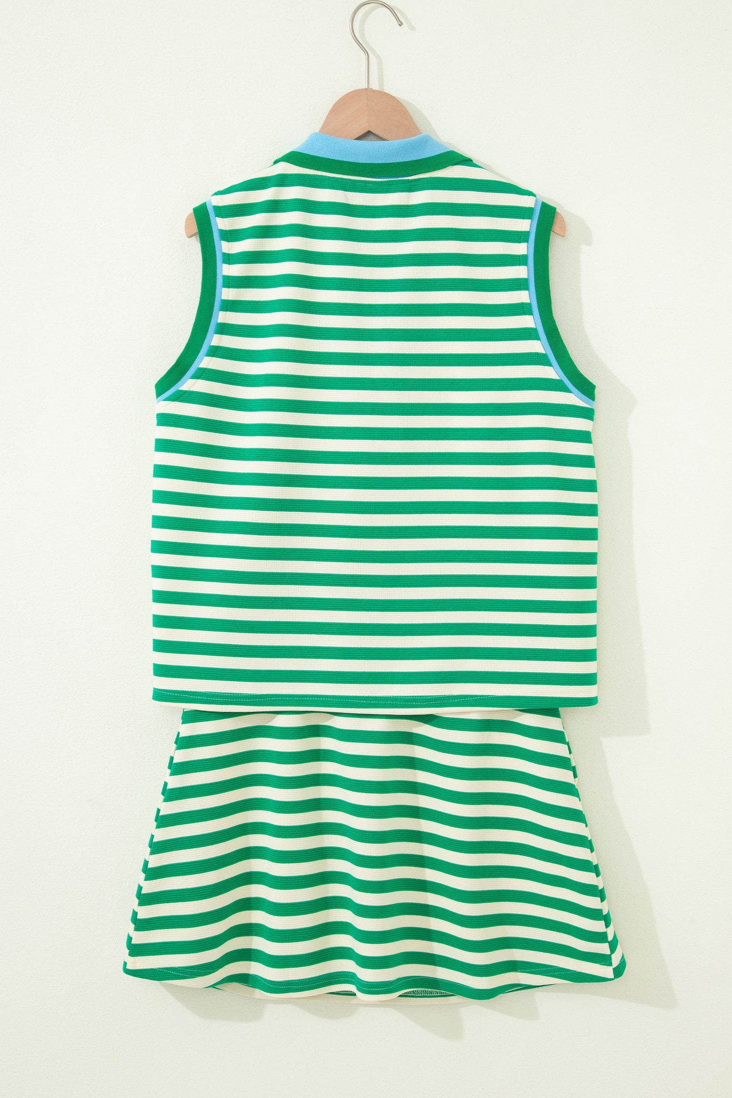 Threaded Pear Ruth sleeveless 2-piece skort set featuring a stylish top and matching skirt for a trendy, casual look.