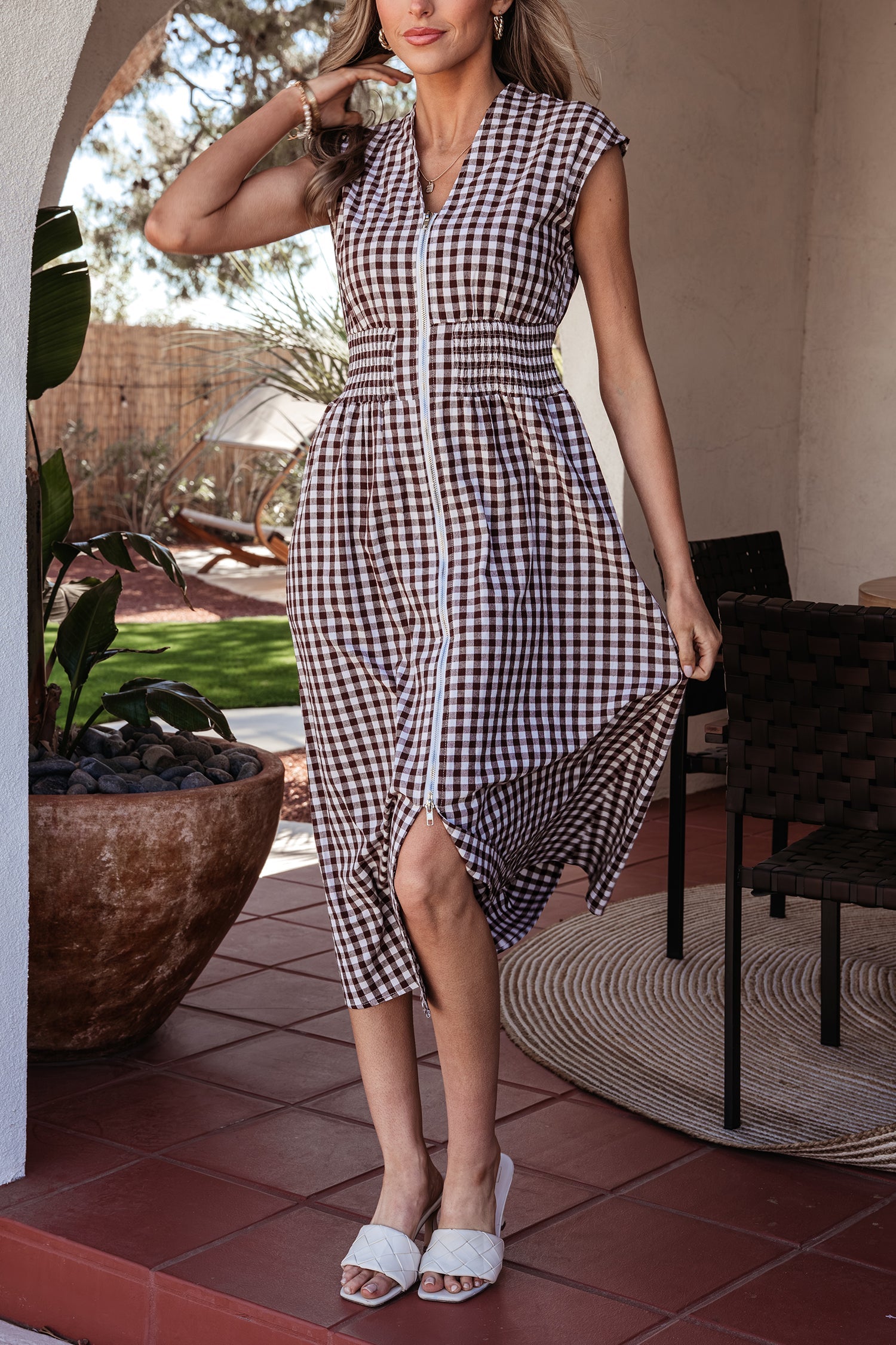 Sleeveless Sarahi Maxi Dress by Threaded Pear featuring a flared silhouette and lightweight fabric, perfect for summer occasions.