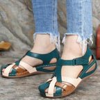 Vintage round toe wedge sandals with cross buckle detail from Plush Fashion Hub, featuring stylish design and comfortable heel.