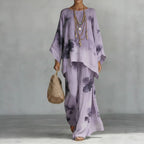 Floral print bamboo linen two-piece set with wide-leg pants by FitiqueFit, featuring a matching top and flowing pant design.