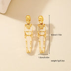 18K gold-plated skeleton earrings for Halloween, featuring detailed skeletal design and gothic style, from Shopimist.