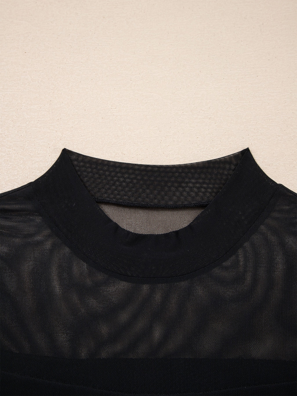 Women's sheer mesh patchwork cap sleeve t-shirt by Plush Fashion Hub, featuring elegant layering design and stylish ring accents.