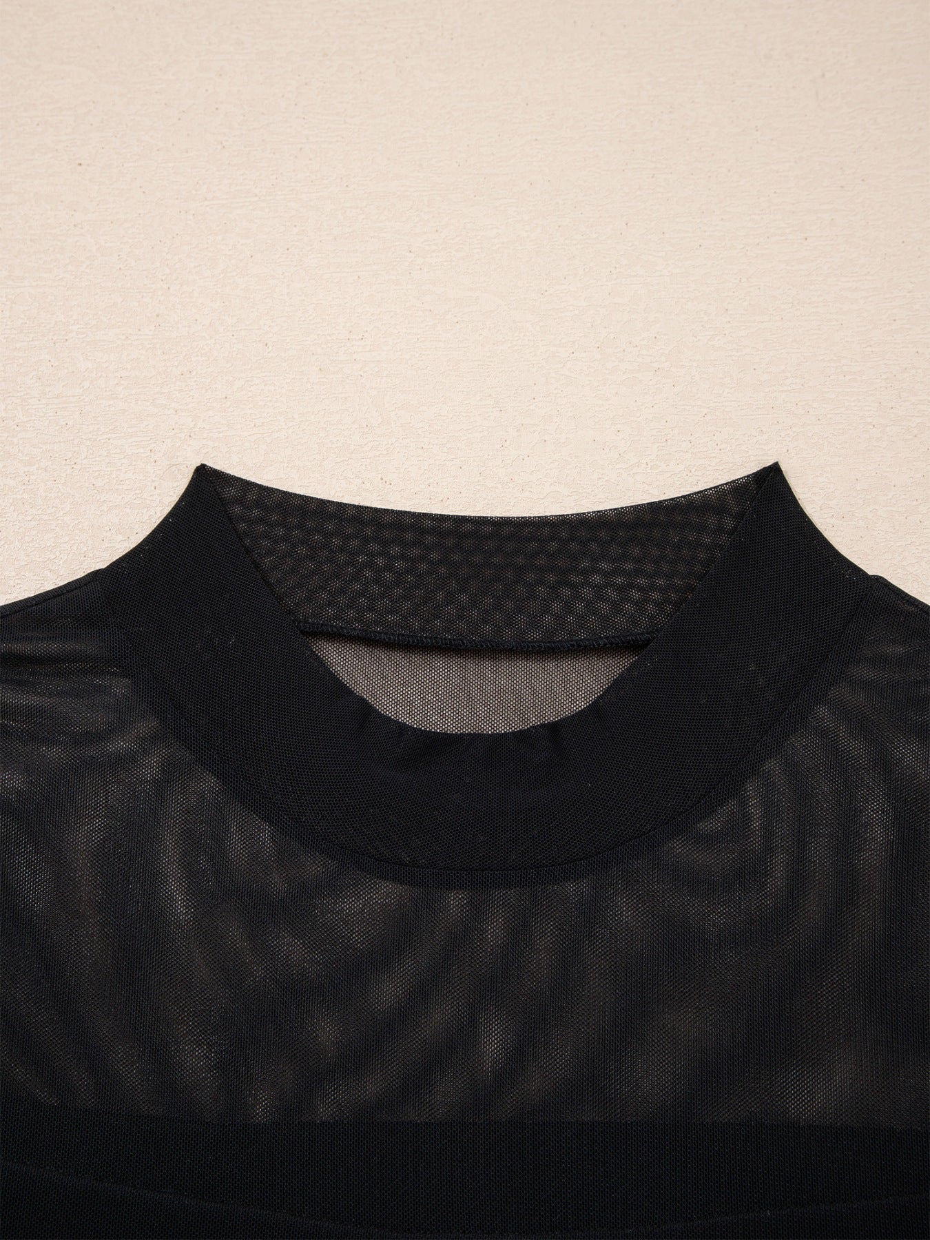 Women's sheer mesh patchwork cap sleeve t-shirt by Plush Fashion Hub, featuring elegant layering design and stylish ring accents.