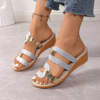 Women's open toe mid-heel wedge sandals by Trendsi, featuring a chic design and comfortable casual footwear style.