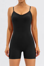 Black spaghetti strap round neck romper from Trendsi, casual activewear with sleeveless design and relaxed fit.