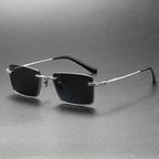 Pure titanium polarized sunglasses in retro British style, featuring sleek eye wear design with comfortable temples and reflective lenses.