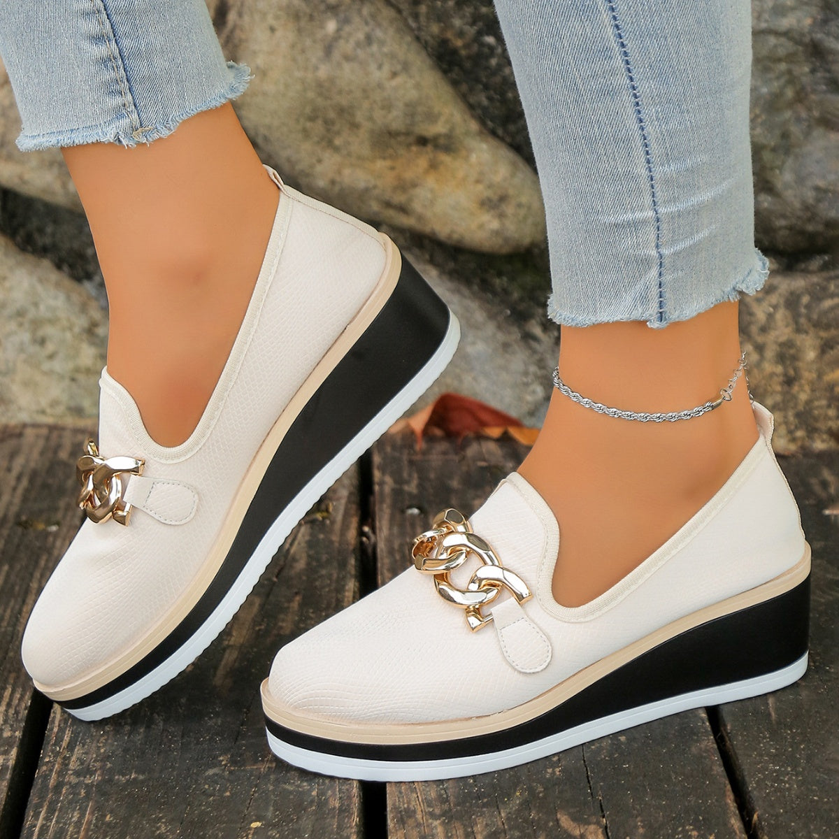 Chain decor wedge loafers from Trendsi featuring stylish footwear with a comfortable wedge heel and chain detail.