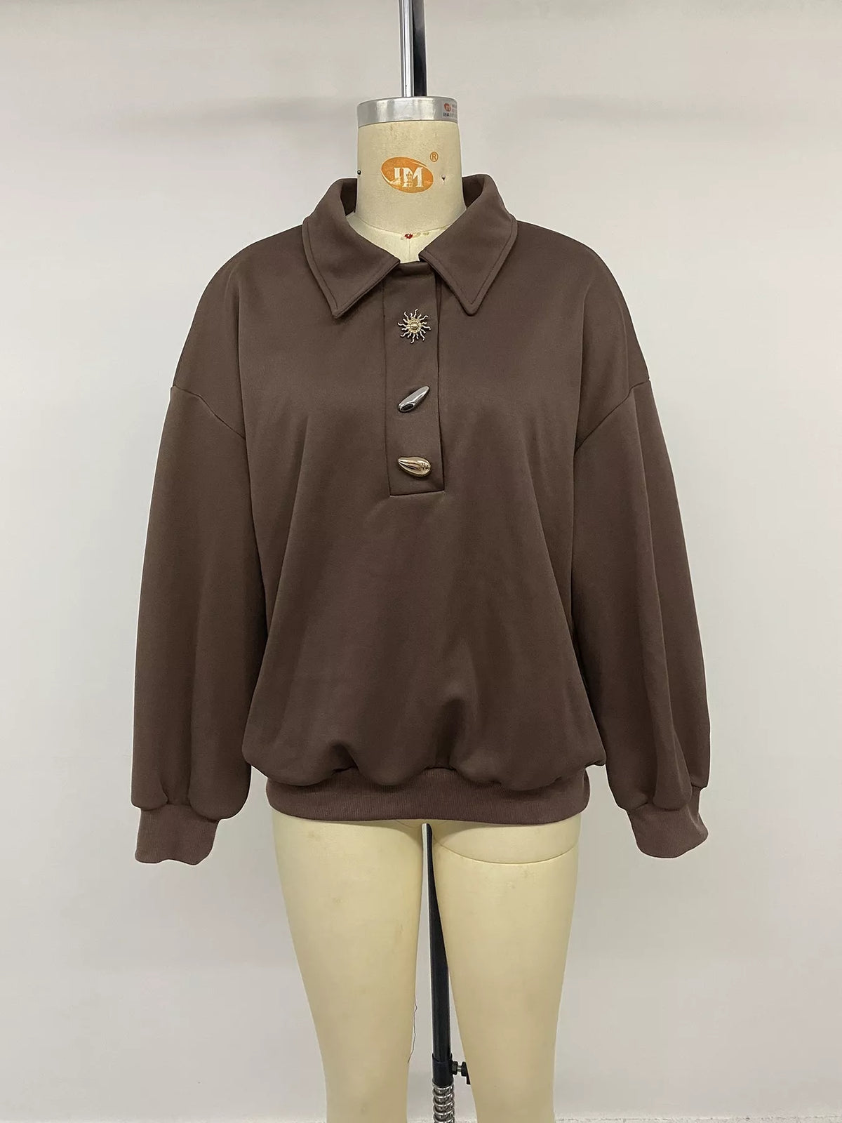 Trendsi polo collar dropped shoulder sweatshirt featuring a relaxed fit and casual style, with visible polo collar and dropped shoulder design.