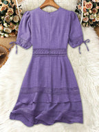 Lace detail V-neck mini dress by Shopimist featuring delicate lace accents and a flattering V-neckline, displayed on a hanger.