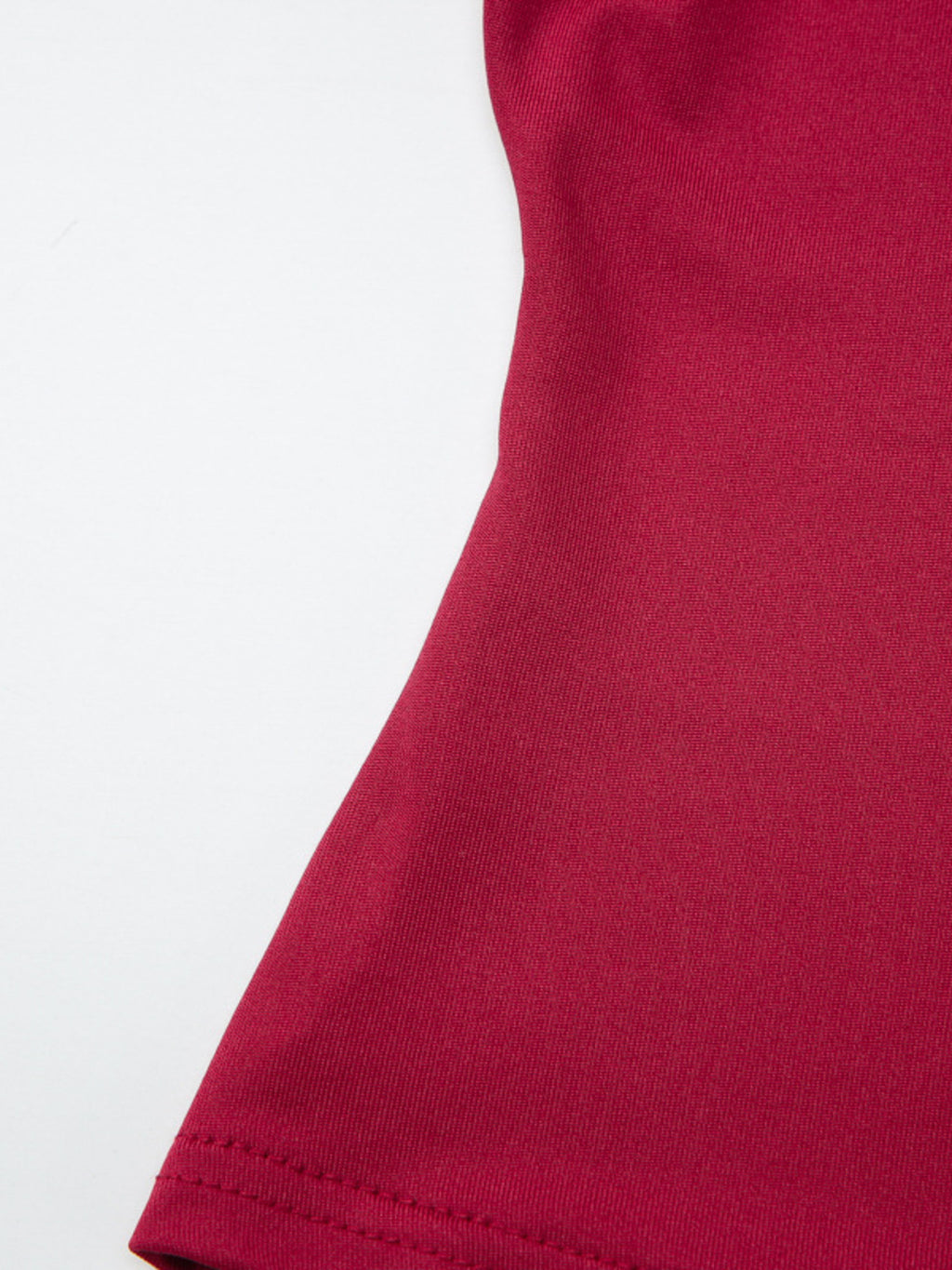 Women's fitted one-shoulder T-shirt with button accents by Trendsi, featuring a stylish and modern design.