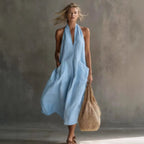 Women's retro V-neck slip dress by FitiqueFit, sleeveless and loose fit casualwear ideal for relaxed summer styling.