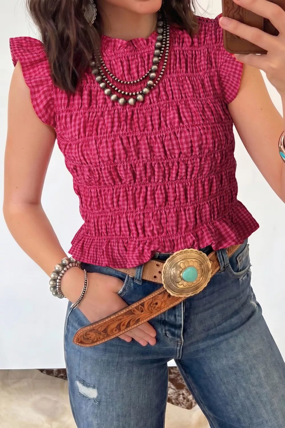 Smocked gingham ruffle sleeve tank top from Plush Fashion Hub featuring a stylish sleeveless design with ruffle accents.
