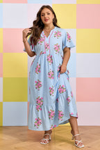 Plus size Lucy Print Scalloped Trim maxi dress by Threaded Pear, featuring a vibrant floral pattern and scalloped hem detail.