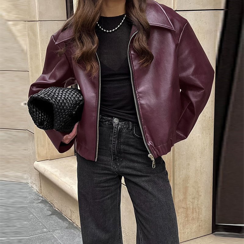 Vintage style women's solid color faux leather jacket from Plush Fashion Hub, showing front view with collar and long sleeves.