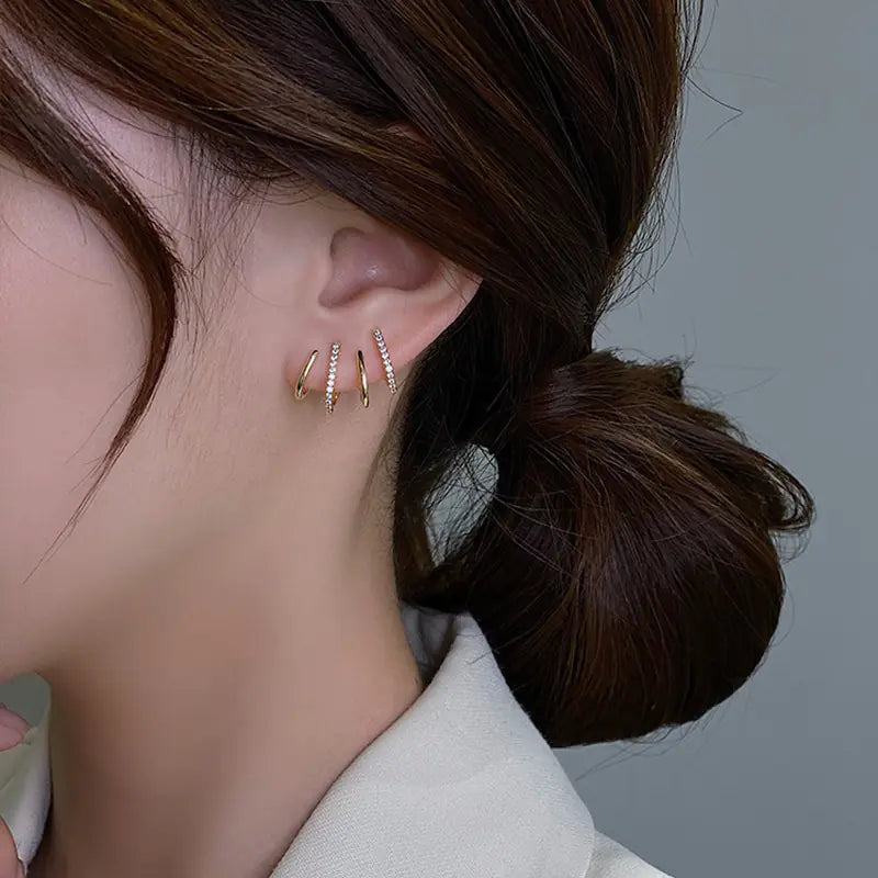 Trendy Fresh Style women's earrings and ear studs featuring modern design, displayed on a neutral background.