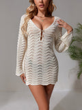 Openwork long sleeve cover-up dress by Shopimist, featuring intricate openwork design and lightweight fabric for beach or poolside wear.