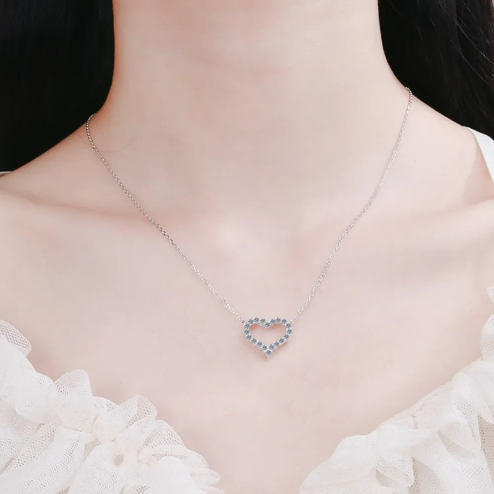 925 Sterling Silver Heart-Shaped Moissanite Necklace with delicate chain, sparkling gemstone, and elegant design.