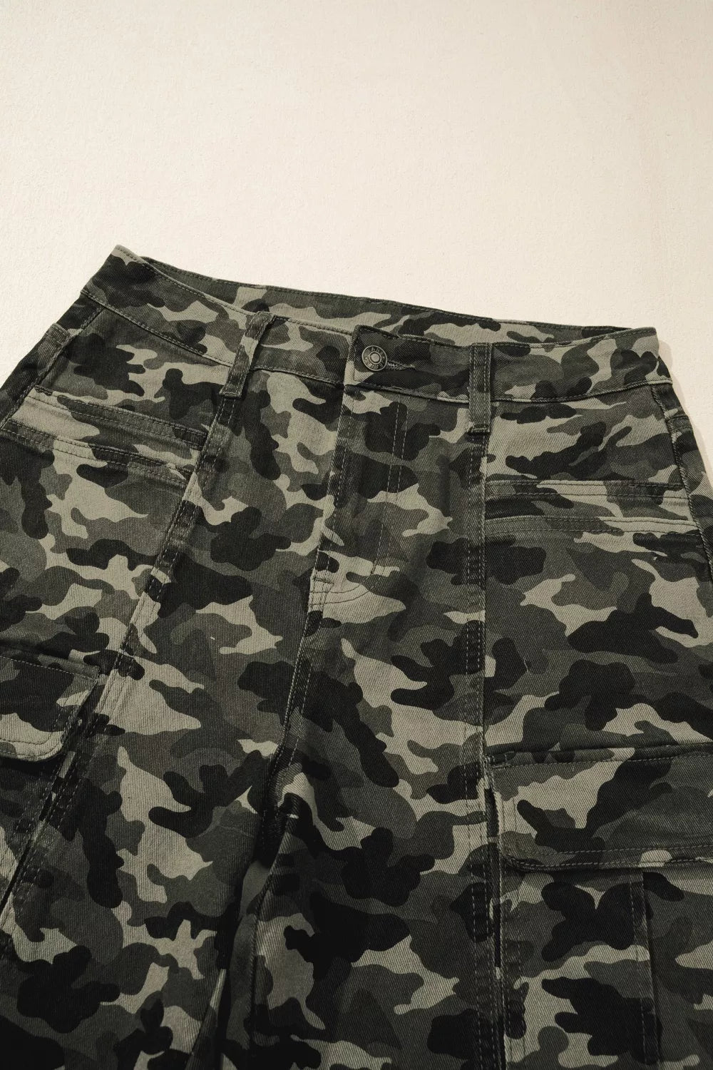 Camouflage print women's denim pants with multiple pockets and a relaxed fit from Shopimist.