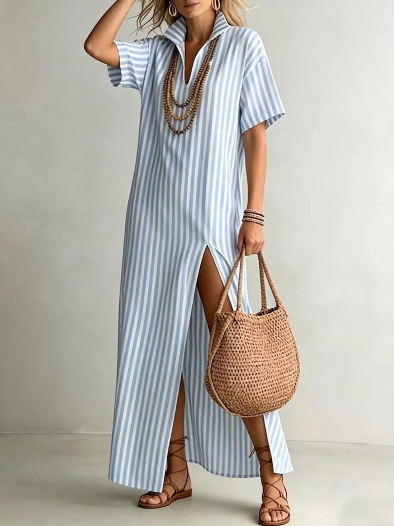 Plus size striped maxi dress with side slit by Trendsi, featuring full-figure flattering design and comfortable fabric.