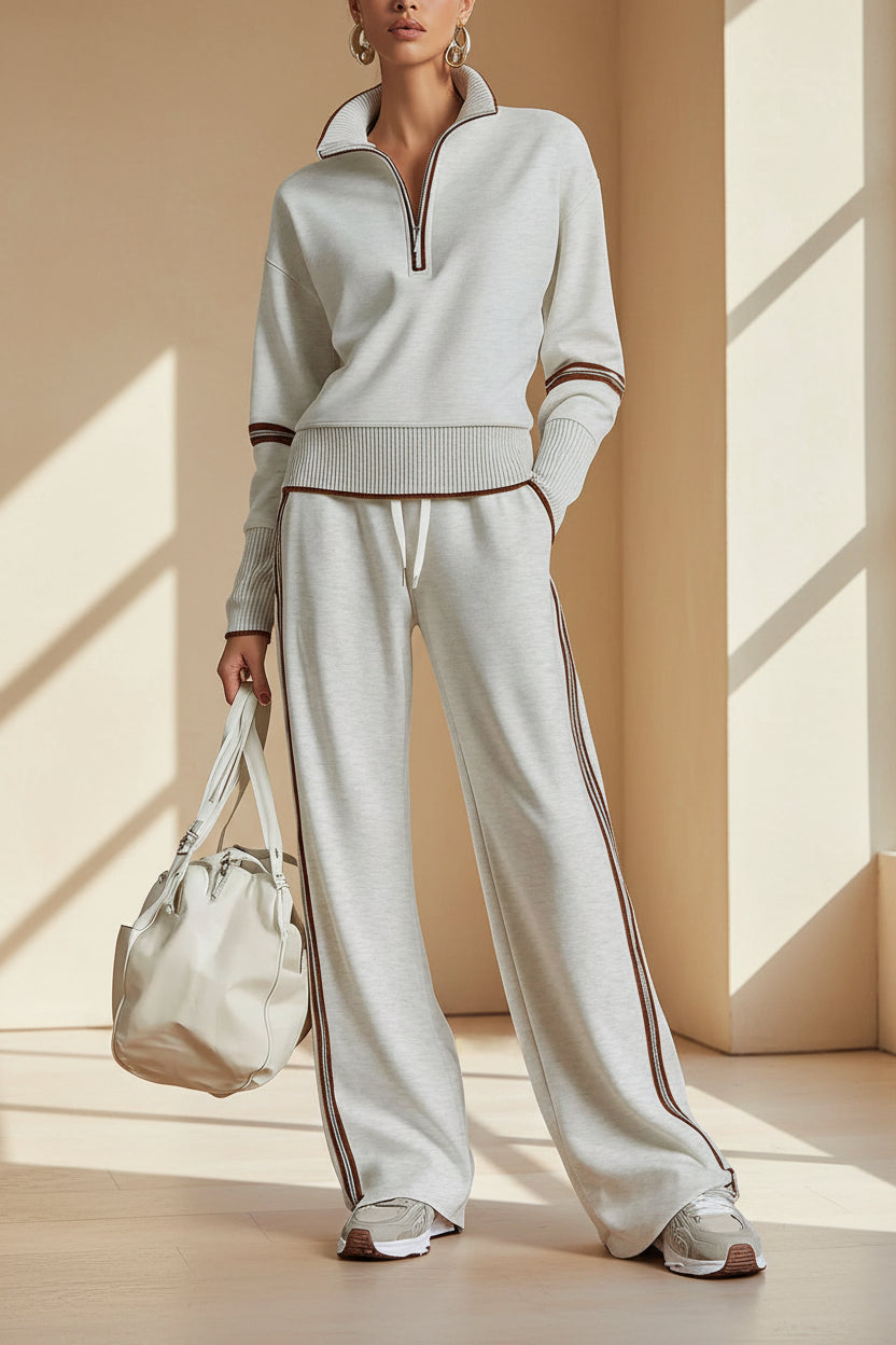 Women’s casual long sleeve two-piece sports set by Plush Fashion Hub, featuring comfortable matching top and pants in a relaxed style.