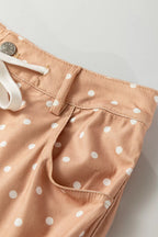 Women's polka dot wide leg drawstring pants by Trendsi, lightweight casual trousers styled as a relaxed, flowy dress.