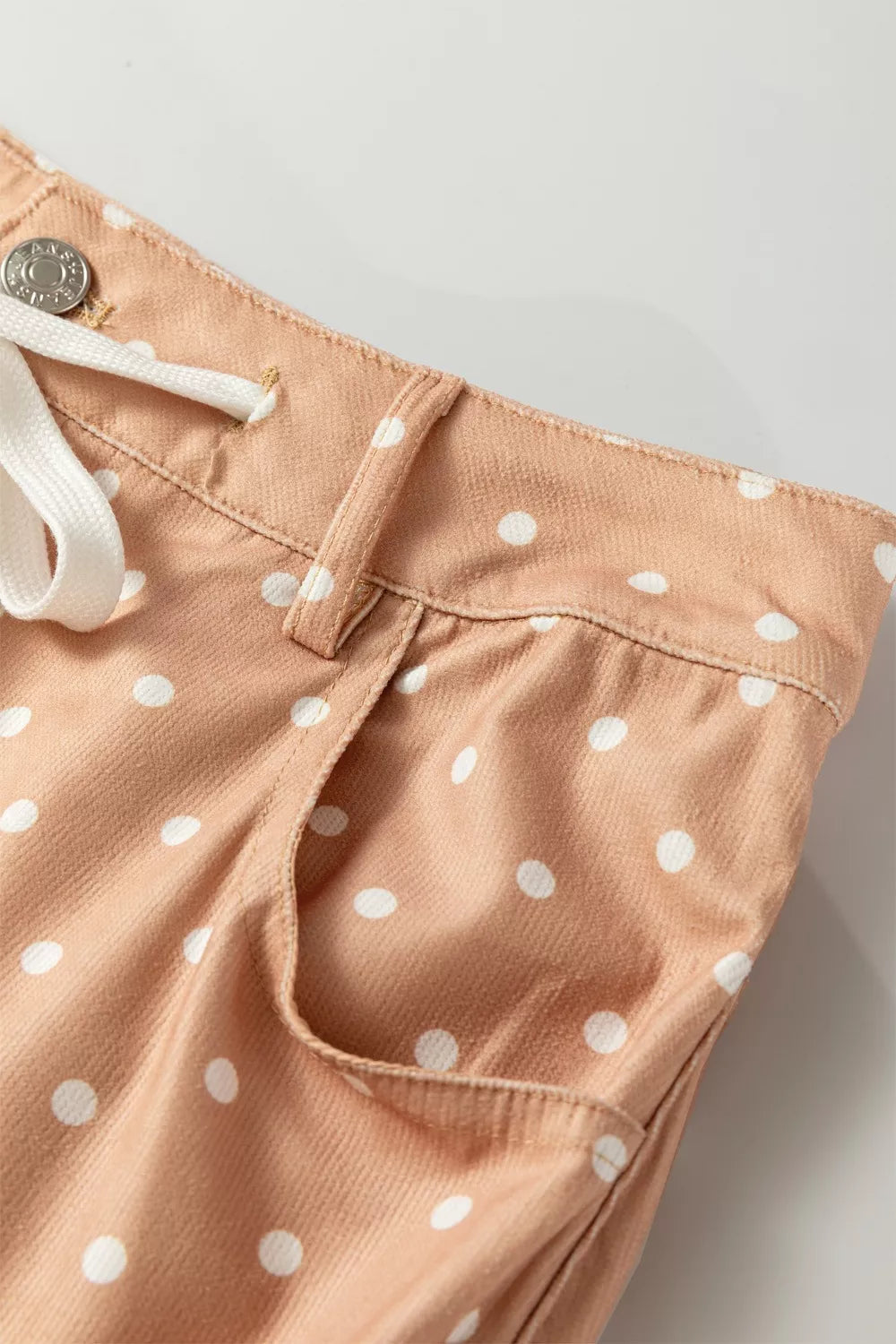 Women's polka dot wide leg drawstring pants by Trendsi, lightweight casual trousers styled as a relaxed, flowy dress.