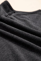 Threaded Pear Macie a Line Tank Top featuring a sleek, fitted design in soft fabric, perfect for casual or athletic wear.