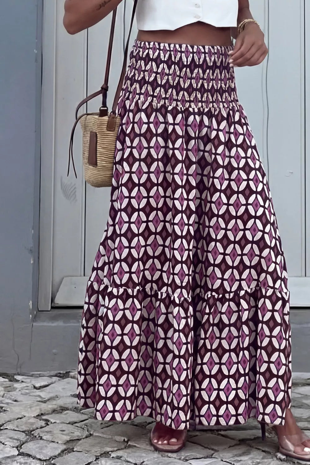 Geometric print smocked waist maxi skirt from Plush Fashion Hub, featuring a flowing dress with bold geometric patterns and a fitted smocked waist.