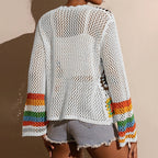 Women's elegant crochet cardigan by FitiqueFit, showcasing intricate knit pattern and lightweight, stylish design.