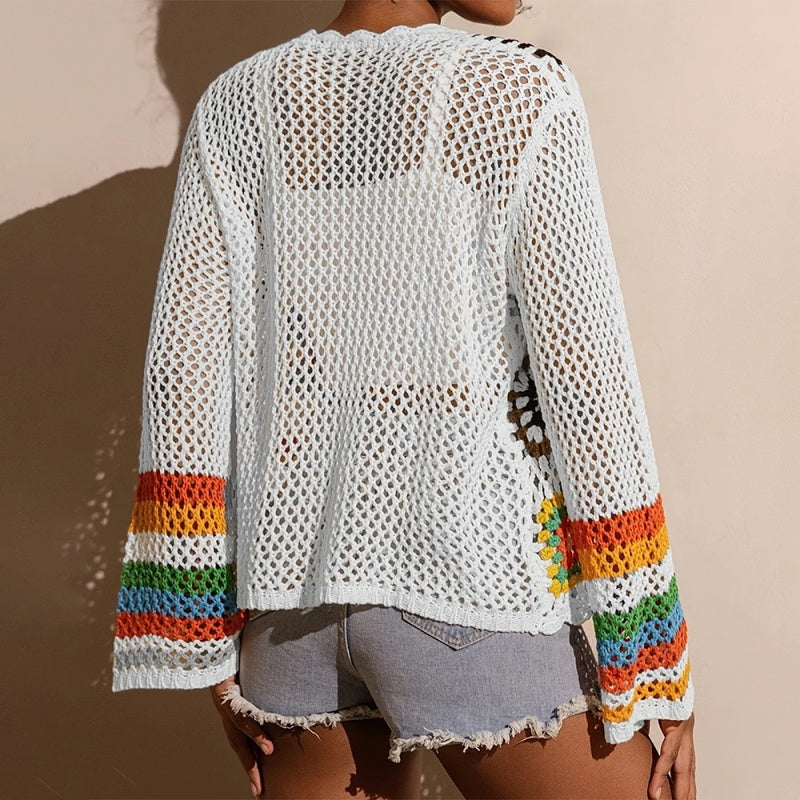 Women's elegant crochet cardigan by FitiqueFit, showcasing intricate knit pattern and lightweight, stylish design.