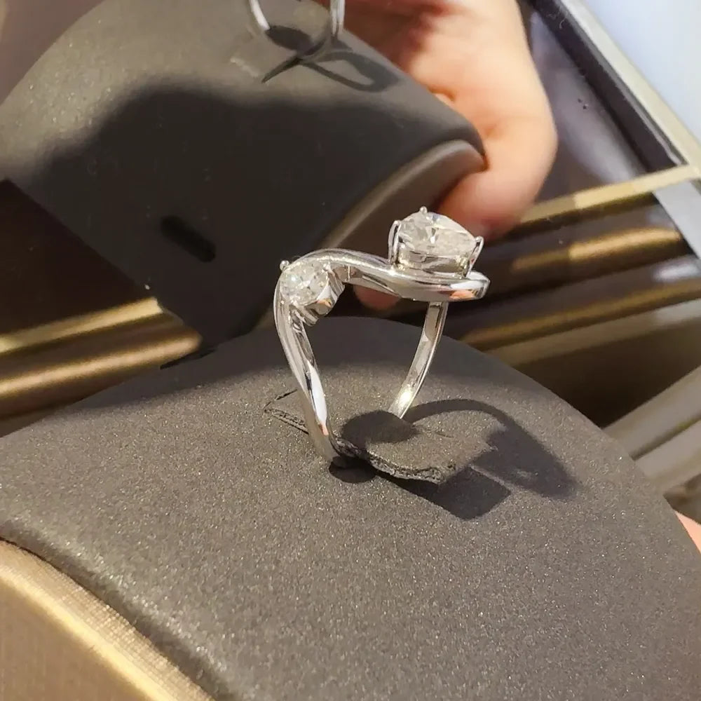 Sterling silver irregular shape ring with 1.3 carat moissanite gemstone, stylish jewelry piece by Shopimist.
