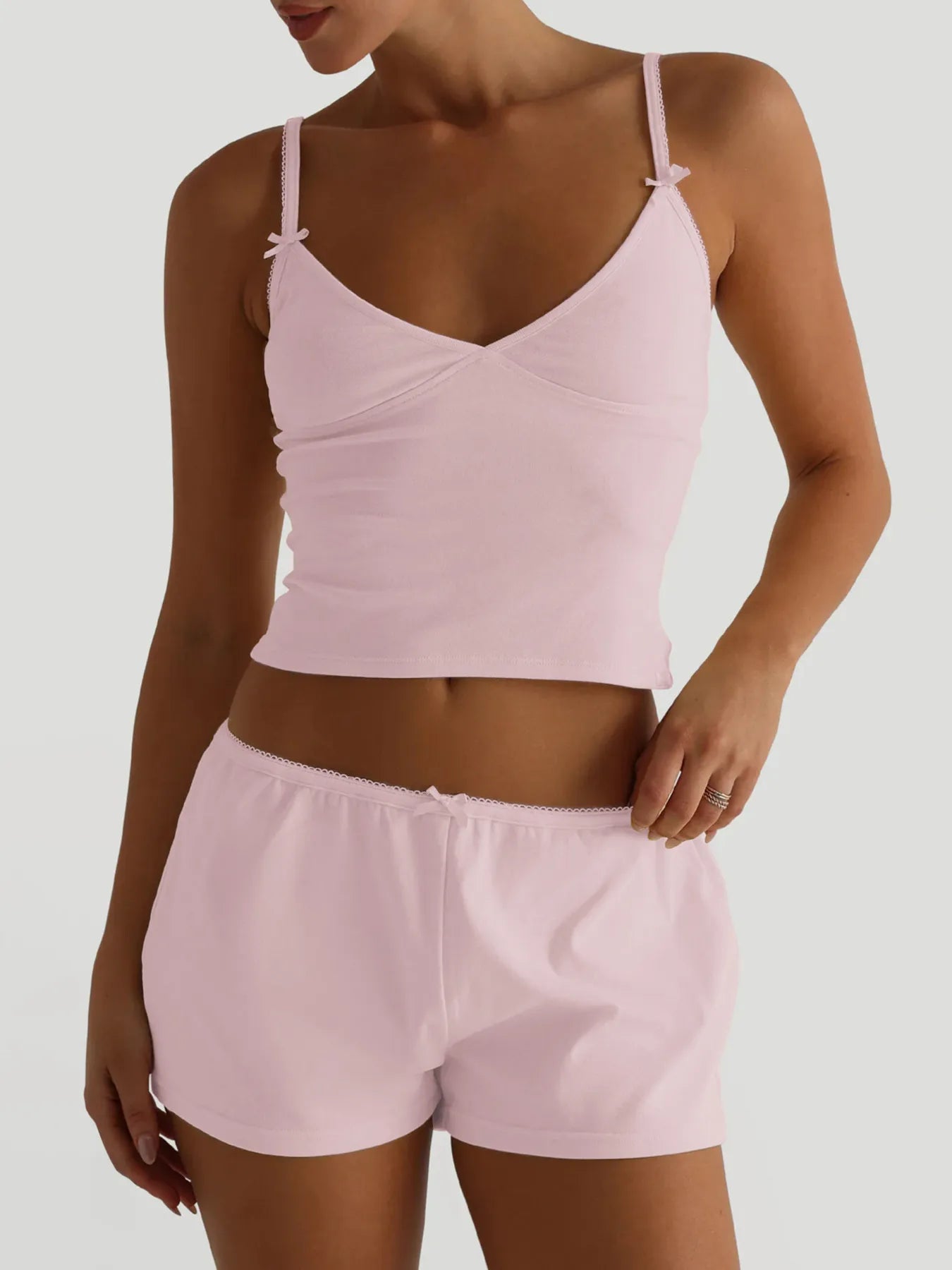 Trendsi V-neck cami and shorts activewear set, lightweight fabric, fitted top with matching shorts for comfortable workout or casual wear.