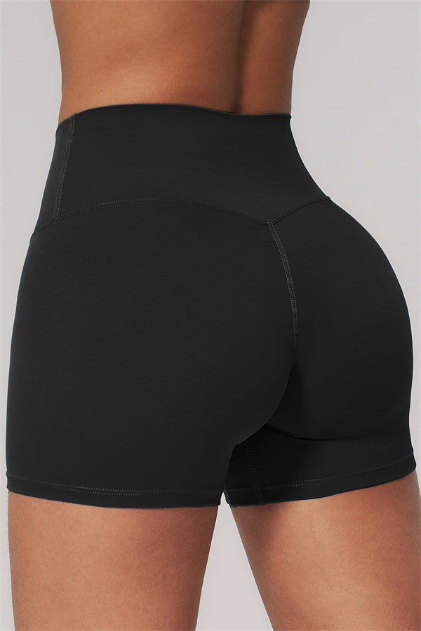 Fitglutes Activewear Rapture Sports Bra and Shorts 2-piece set, black workout gymwear on a model during exercise.