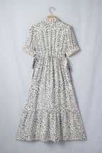 Women's leopard print button-down midi dress by Trendsi, casual chic Viscose blend with long sleeves and stylish silhouette.