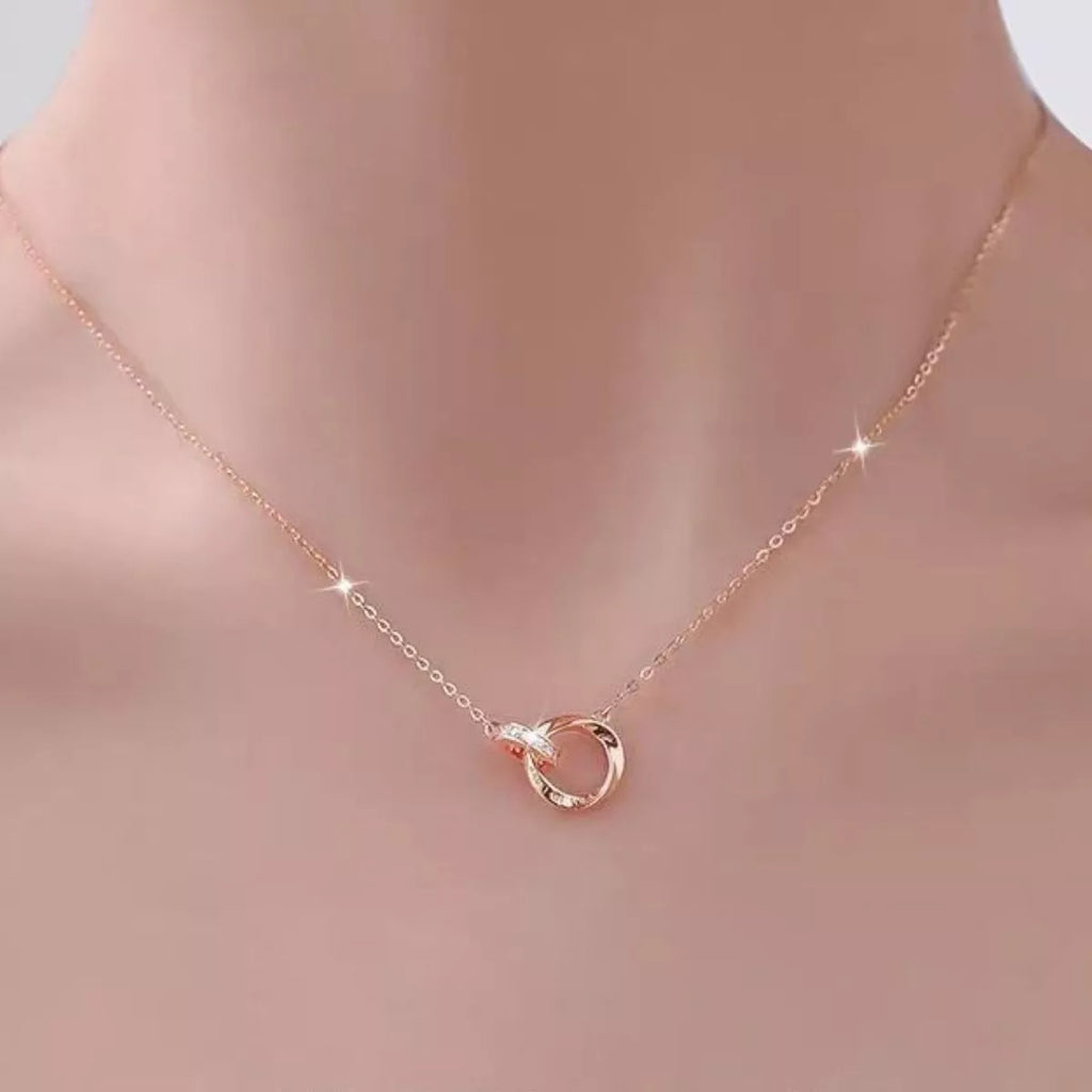 18K rose gold-plated sterling silver necklace with delicate chain and subtle shine, showcasing elegant jewelry design.