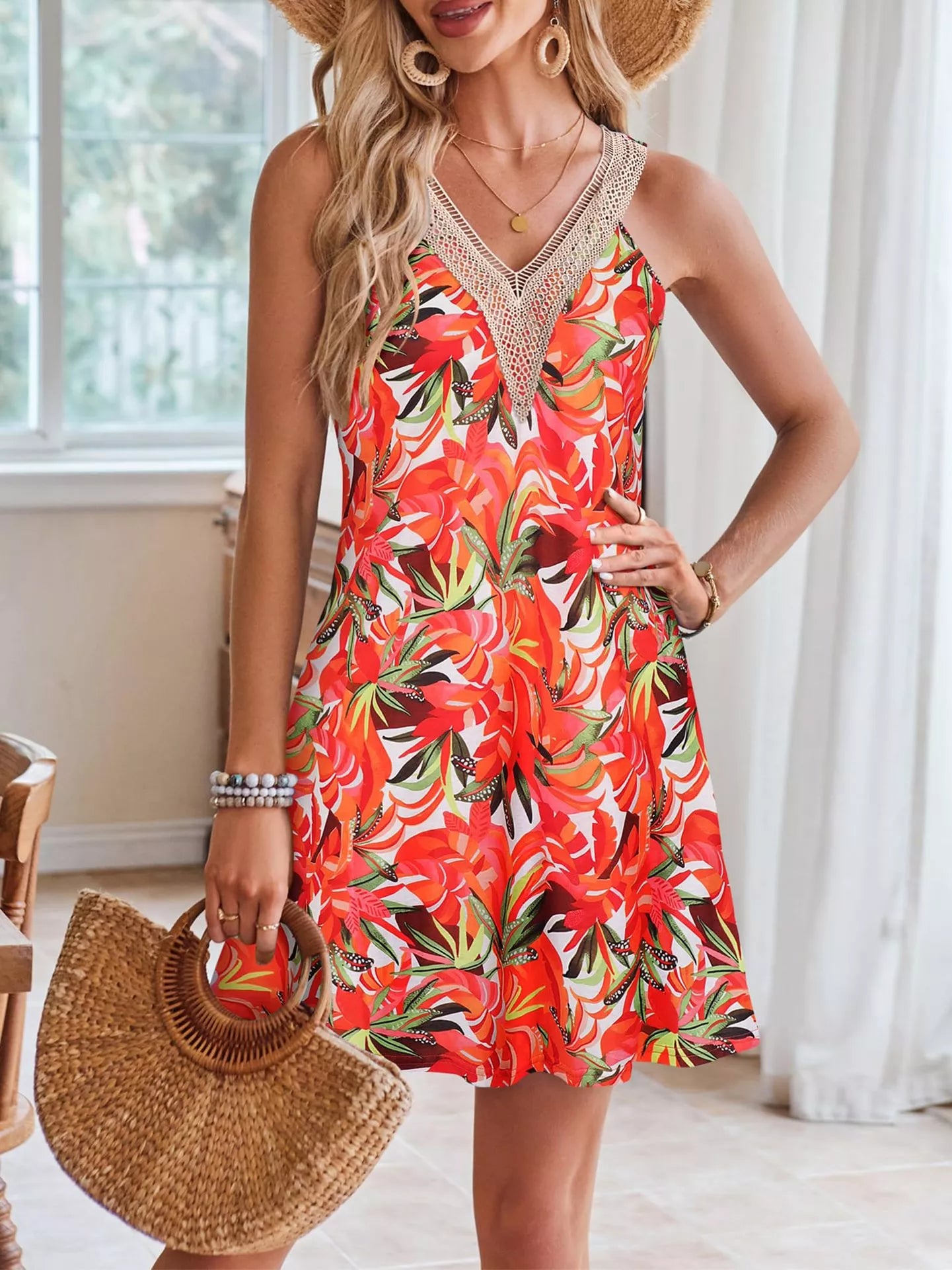 Tropical leaf print V-neck sleeveless dress by Shopimist featuring vibrant green foliage and a relaxed fit.