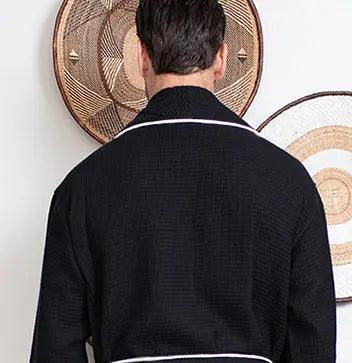Back view of Plush Fashion Hub men's premium waffle piping robe in small size, black with contrasting piping details.