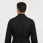 Black waffle spa bathrobe for men, lightweight and absorbent, shown from the back with small size, by Plush Fashion Hub.