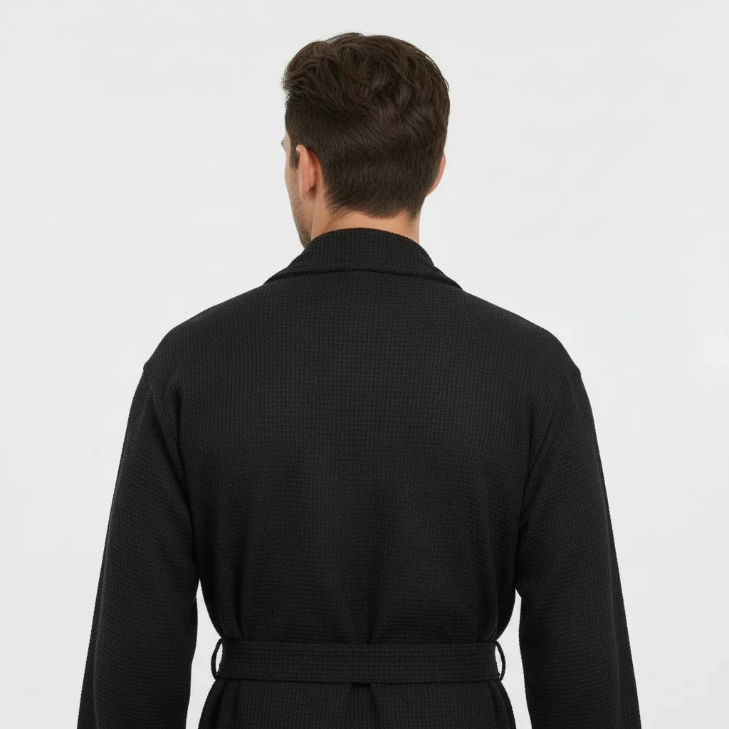 Black waffle spa bathrobe for men, lightweight and absorbent, shown from the back with small size, by Plush Fashion Hub.