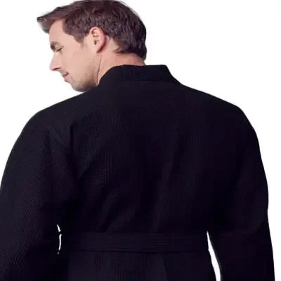 Black men's waffle spa bathrobe from Plush Fashion Hub, lightweight and absorbent, shown from the back.