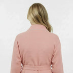 Back view of a small blush women's waffle piping bathrobe from Plush Fashion Hub, lightweight spa-style comfort.
