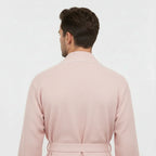 Back view of small blush plush men's waffle piping robe from Plush Fashion Hub, showcasing soft fabric and piping details.