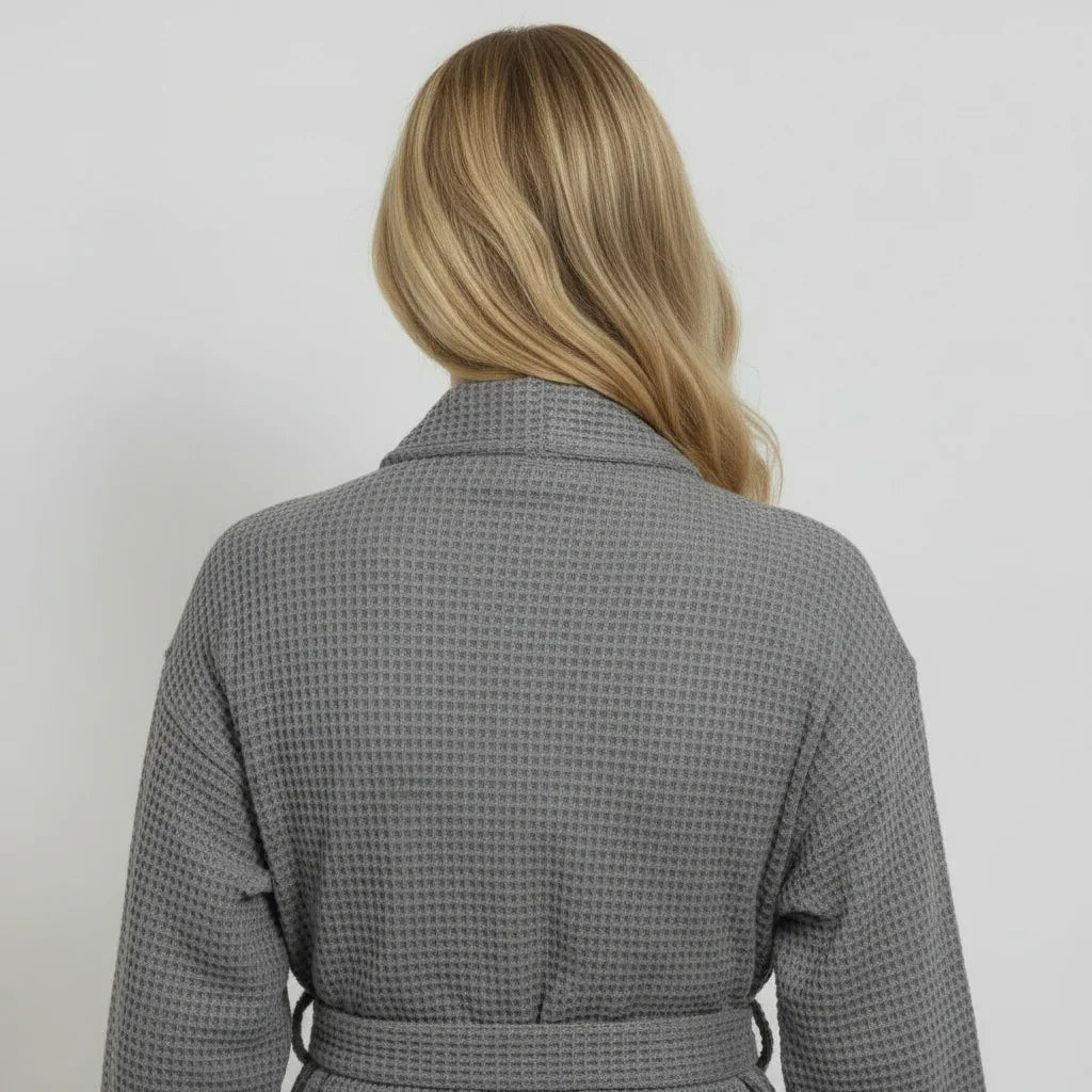 Dark grey knee-length waffle robe for women by Plush Fashion Hub, showing the back view of a cozy kimono-style robe.