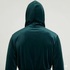 Back view of plush green and black men's hooded robe from Plush Fashion Hub, showcasing soft fabric and cozy hood.