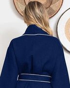 Navy knee-length waffle robe for women with piping, back view, from Plush Fashion Hub, soft and cozy lounge robe.