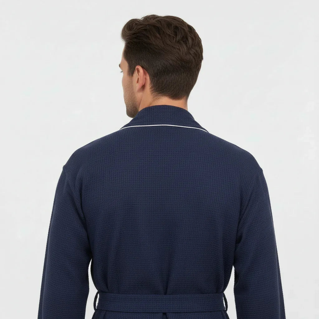 Back view of small navy men's waffle piping robe from Plush Fashion Hub, showcasing the soft fabric and detailed piping design.