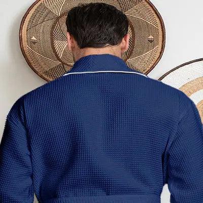 Back view of navy men's plush waffle piping robe with small piping details, made by Plush Fashion Hub.