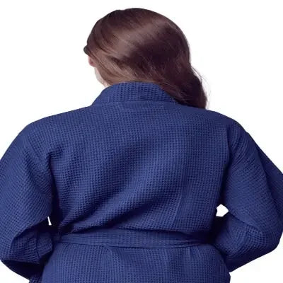 Navy women's lightweight waffle robe from Plush Fashion Hub, shown from the back, with quick-dry spa comfort fabric.