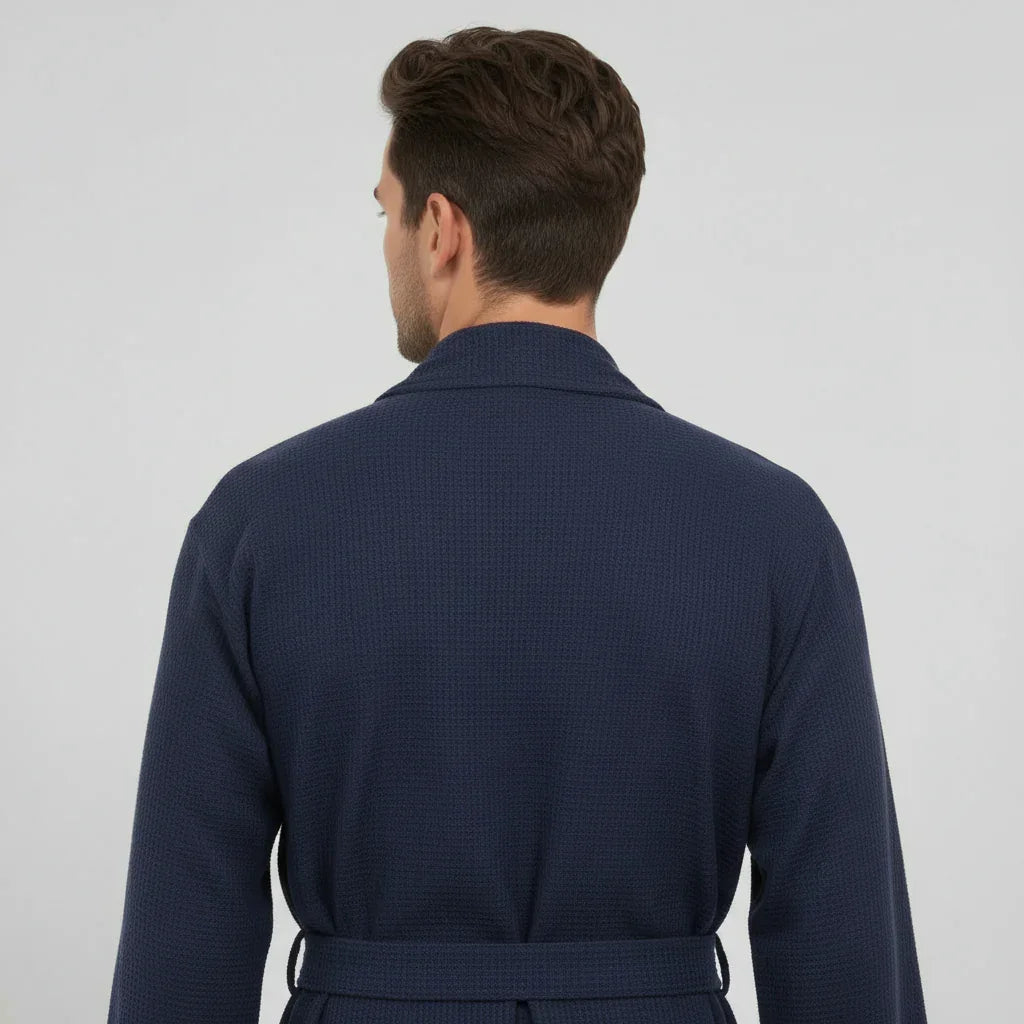 Navy blue waffle spa bathrobe for men by Plush Fashion Hub, lightweight and absorbent, shown from the back.