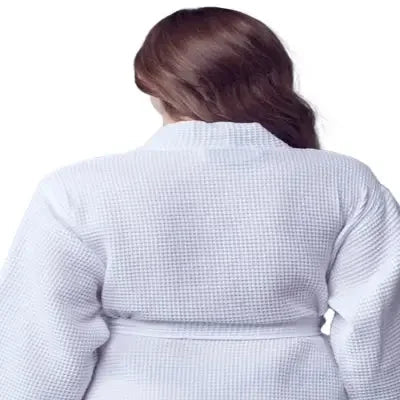 Small white women's waffle robe by Plush Fashion Hub with lightweight, quick-dry spa comfort, shown from the back.